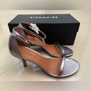 Coach gunmetal heel sandals brand new. 2.75” heel.